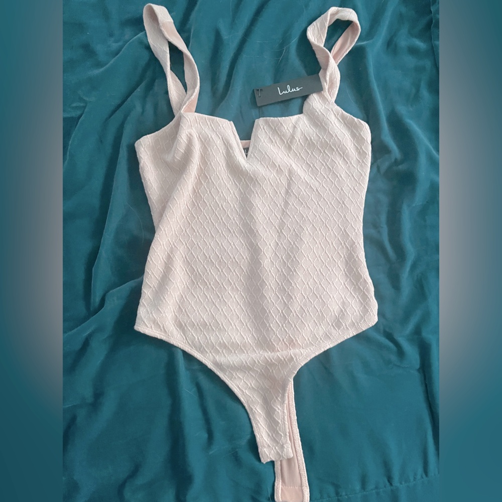Lulu’s baby pink bodysuit